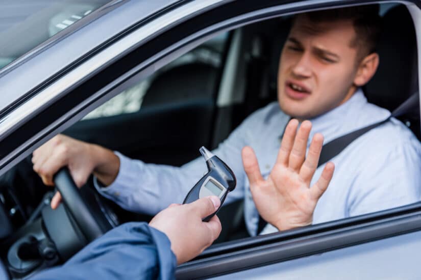 A Driver In His Car Refusing A Breathalyser Test